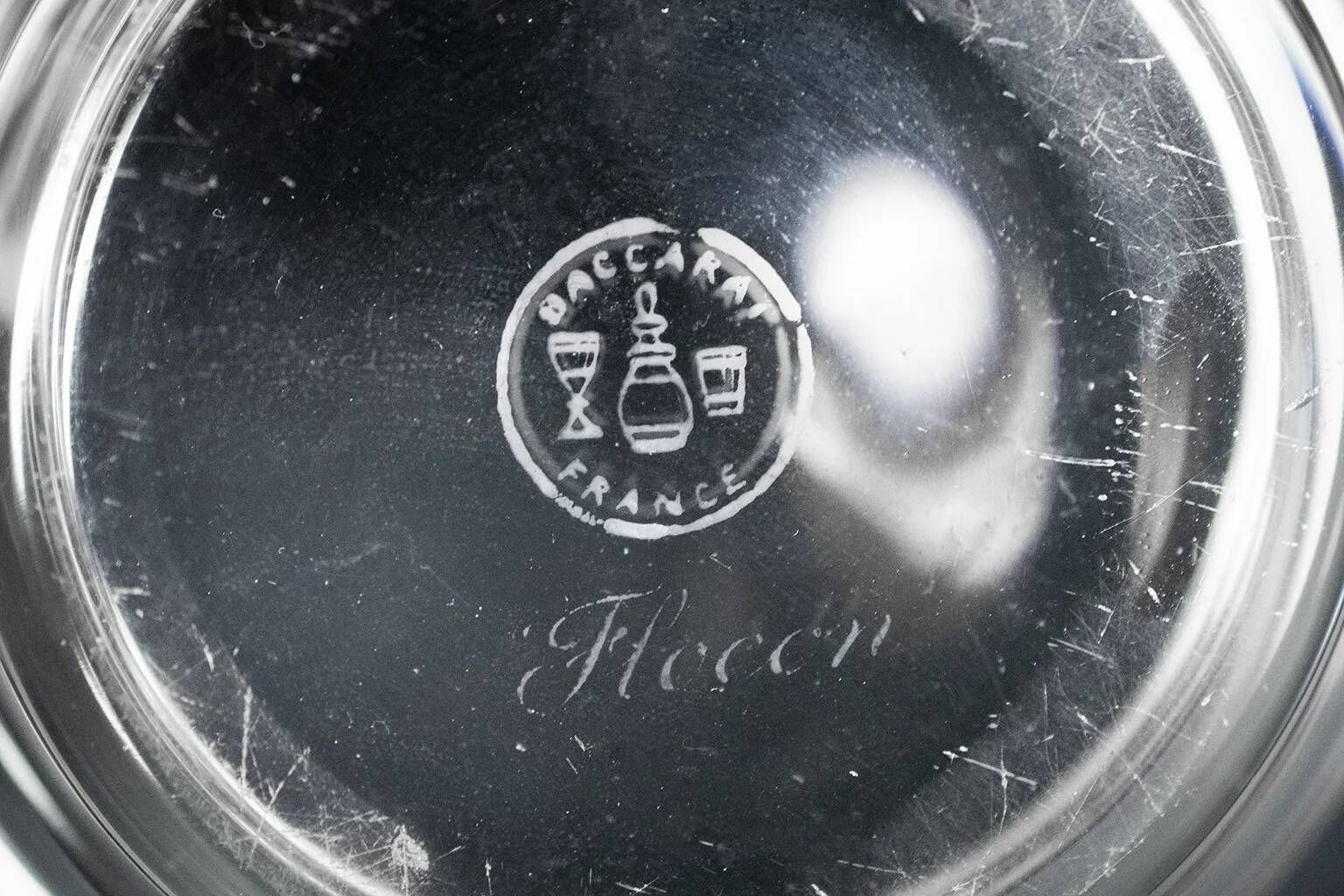 Baccarat crystal dish with wavy profile, acid-etched mark.