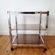 Chrome metal and smoked glass dessert table, 1980s.