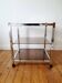 Chrome metal and smoked glass dessert table, 1980s.