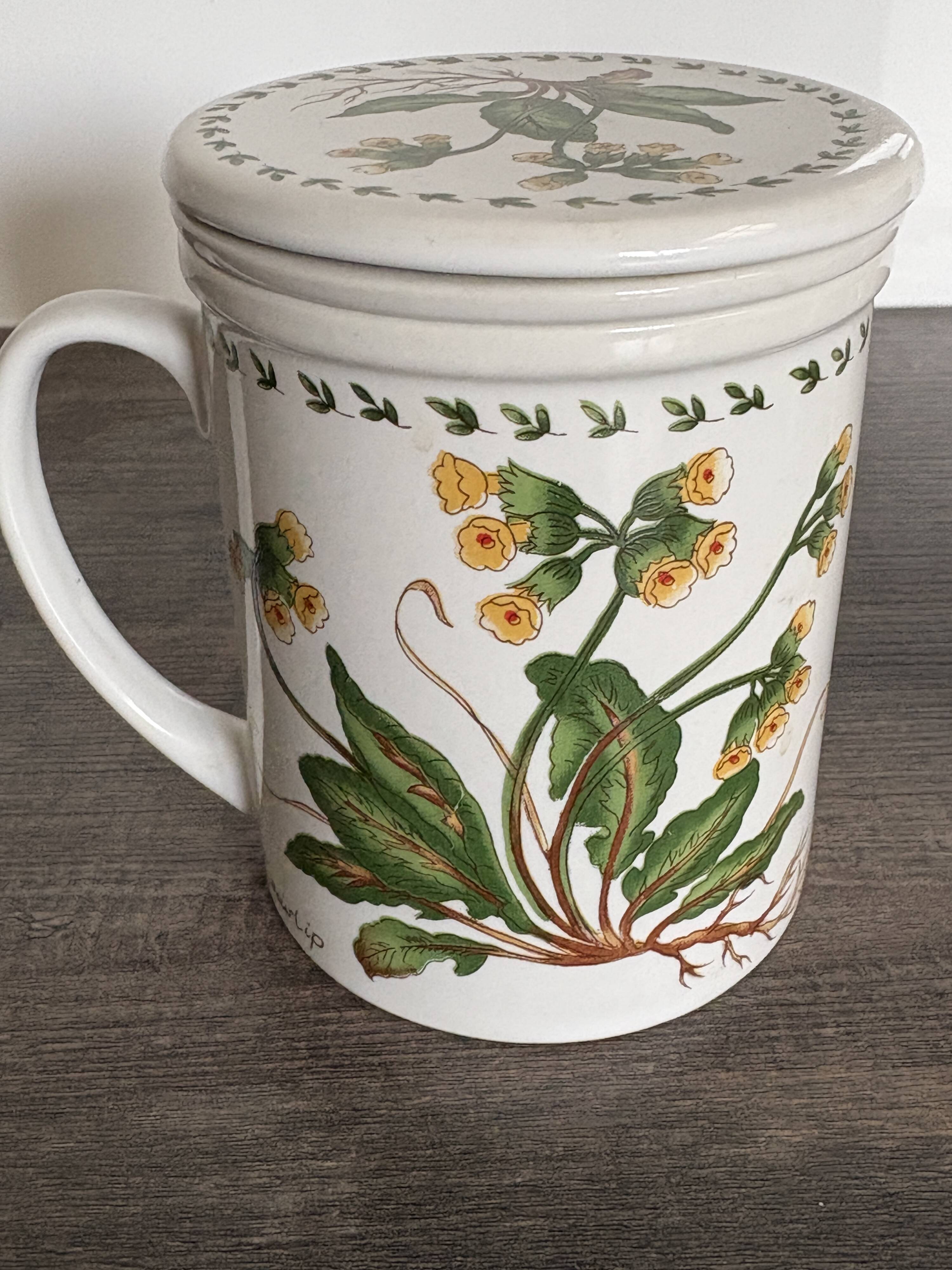 Pair of vintage infusion mugs.