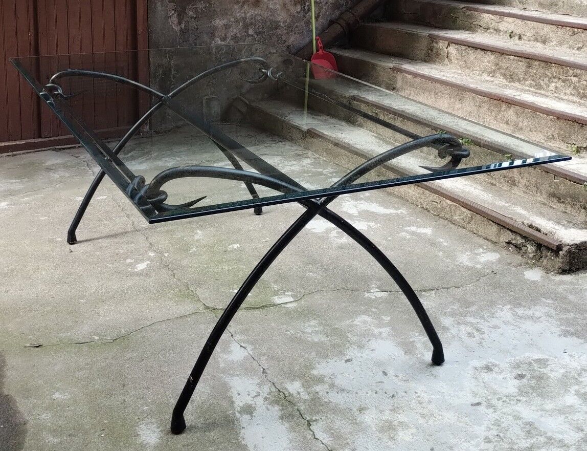 Wrought iron and glass dining table