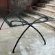 Wrought iron and glass dining table