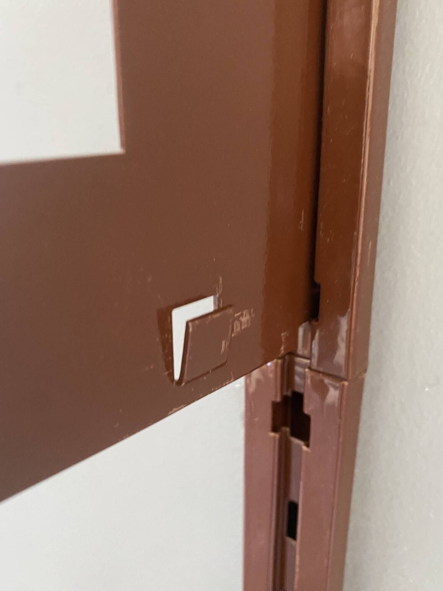 Modular metal wall shelf in brown and beige vintage 70s design.