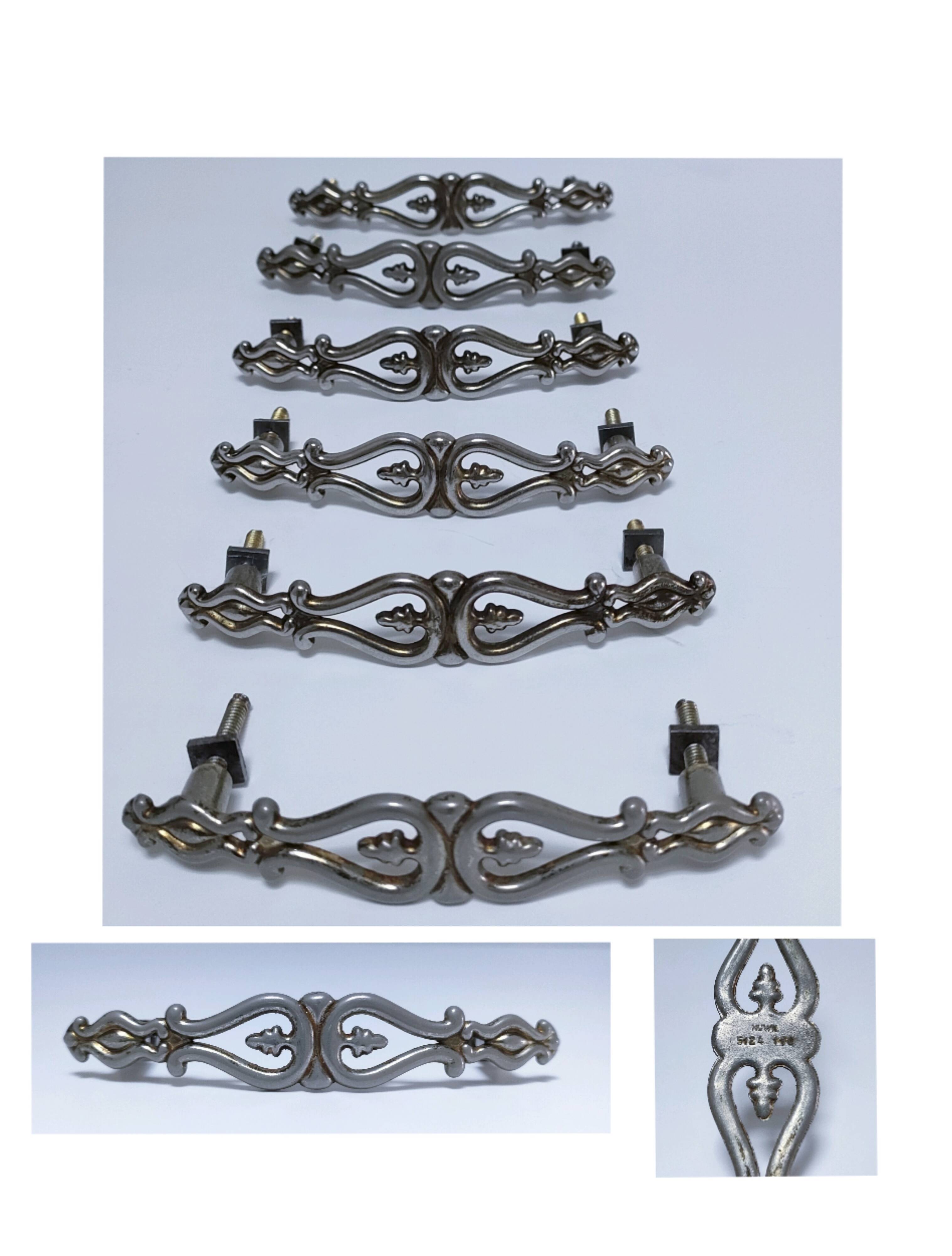 Six Huwil metal handles for neo-classical drawers from the 60s