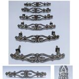 Six Huwil metal handles for neo-classical drawers from the 60s