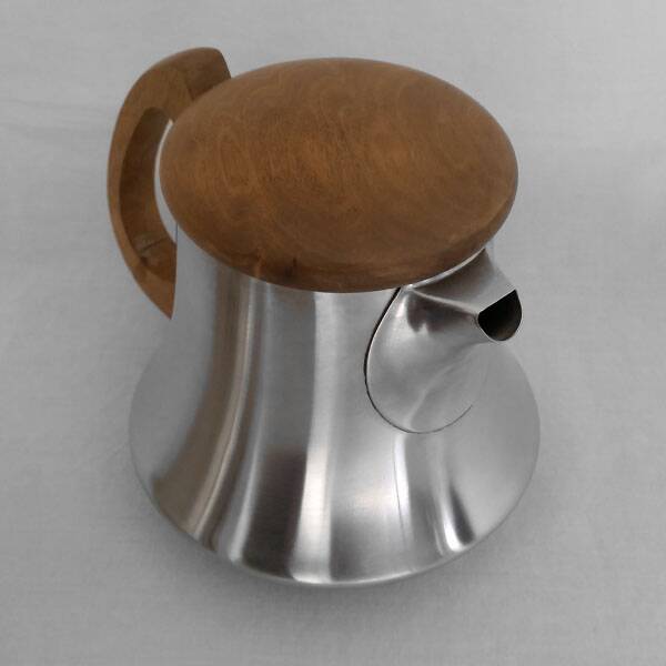 Letang and Remy tea and coffee service in plain stainless steel, exotic wood handles and lids.
