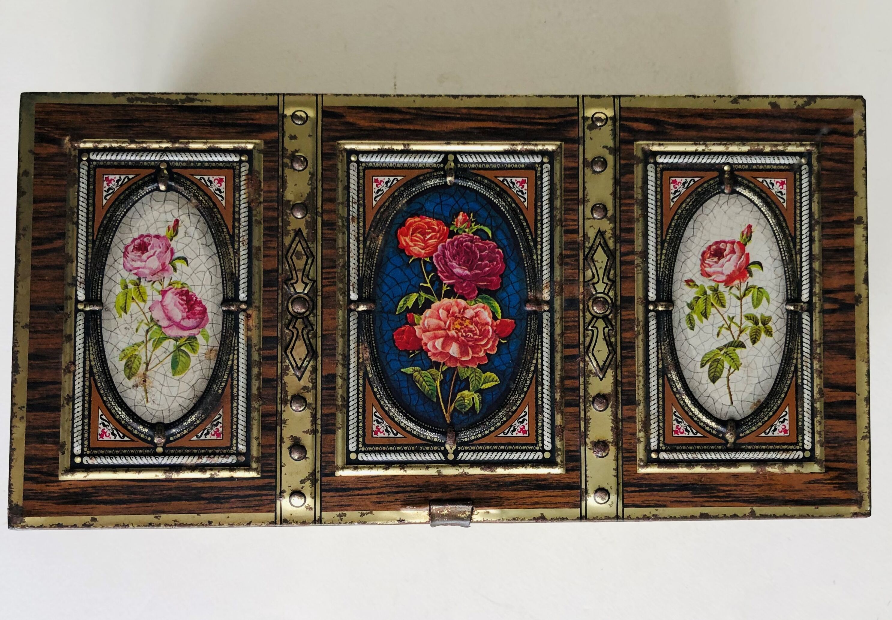 Old metal box decorated with flowers