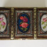 Old metal box decorated with flowers
