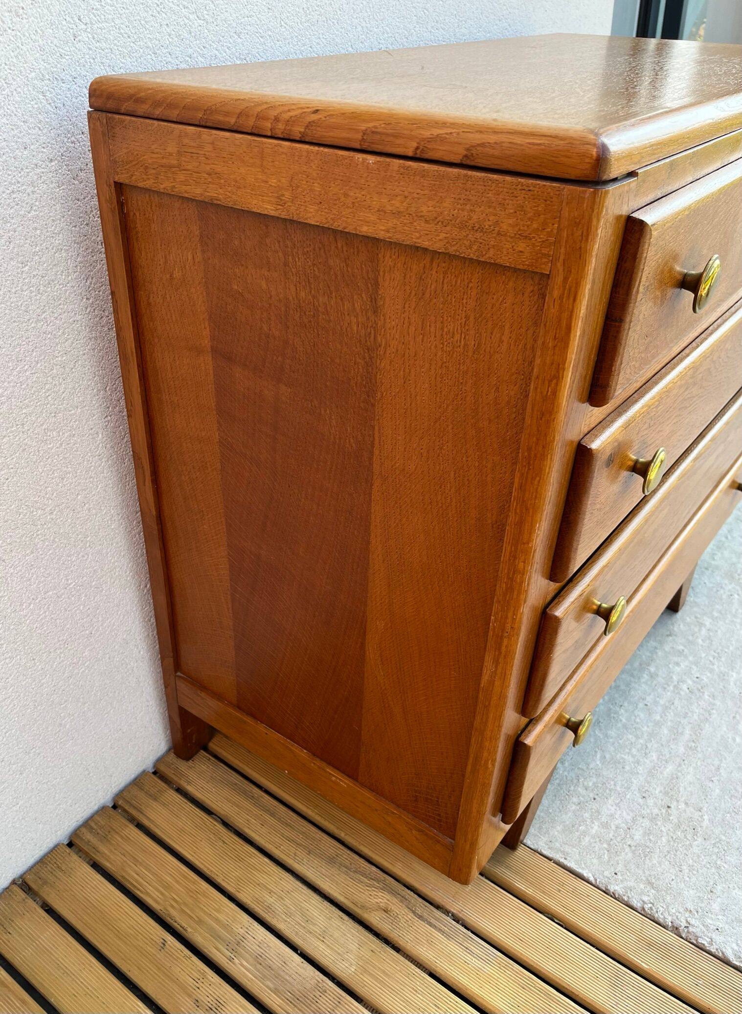 Oak art deco chest of drawers, compass legs