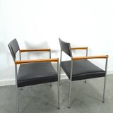 Chaises DDR avec base chromée et revêtement noir, chaises de salle à manger