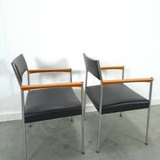 Chairs DDR with chrome base and black upholstery, dining chairs