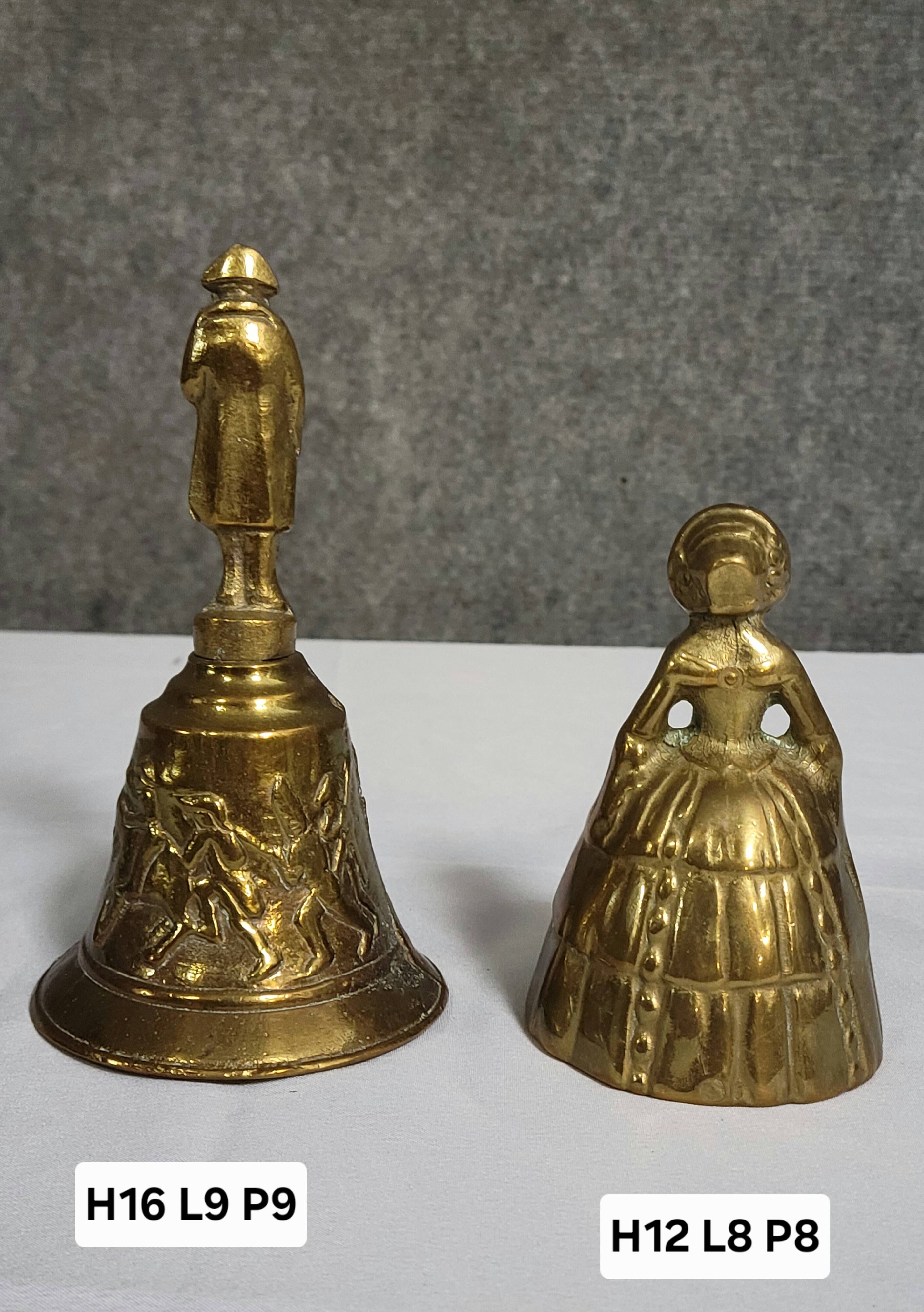 Two vintage bronze table cloches, finely chiseled and gilded