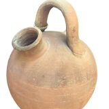 Old terracotta jug called "Gargoulette"