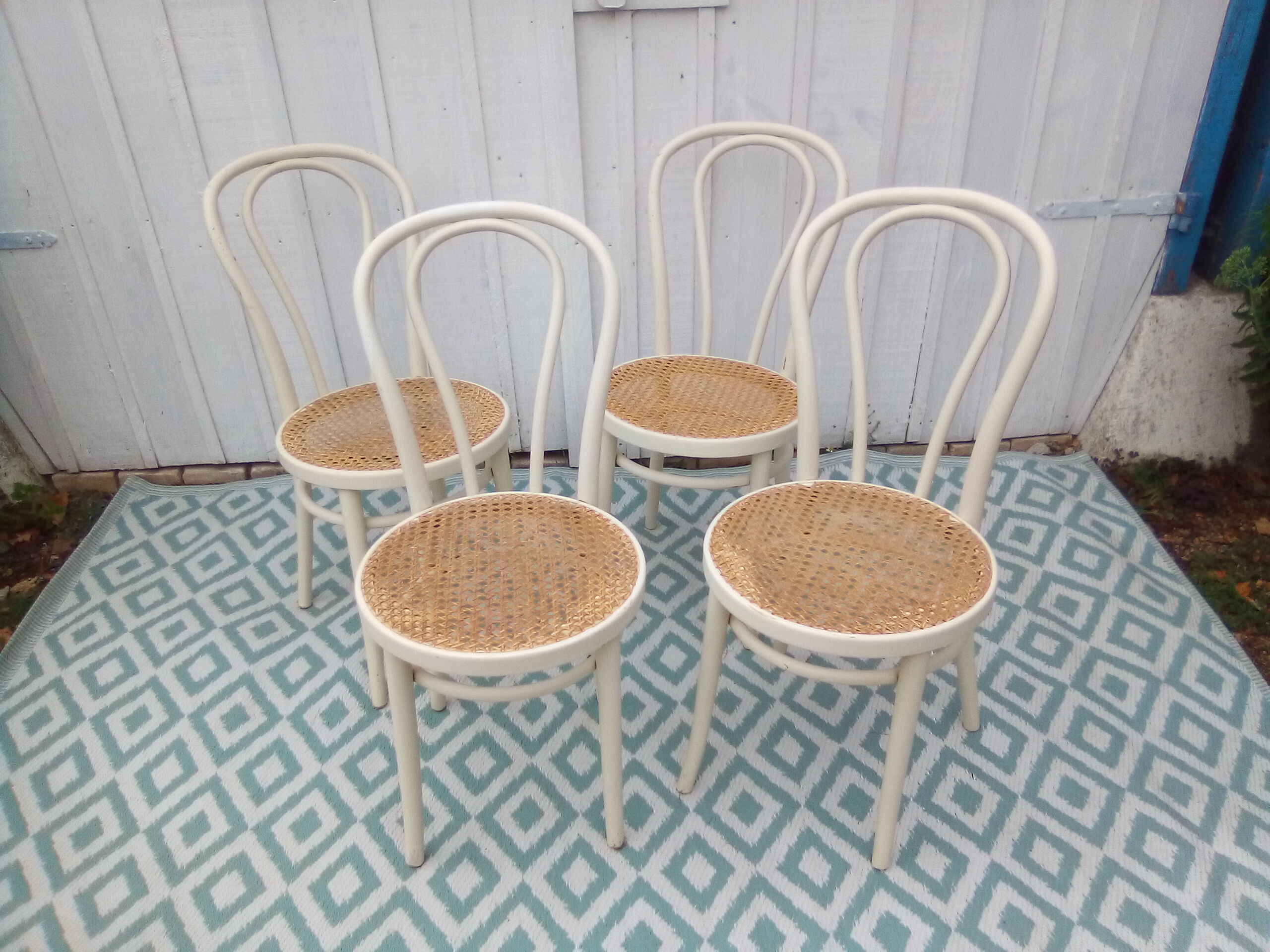 Lot of 4 bistro chairs in caned wood