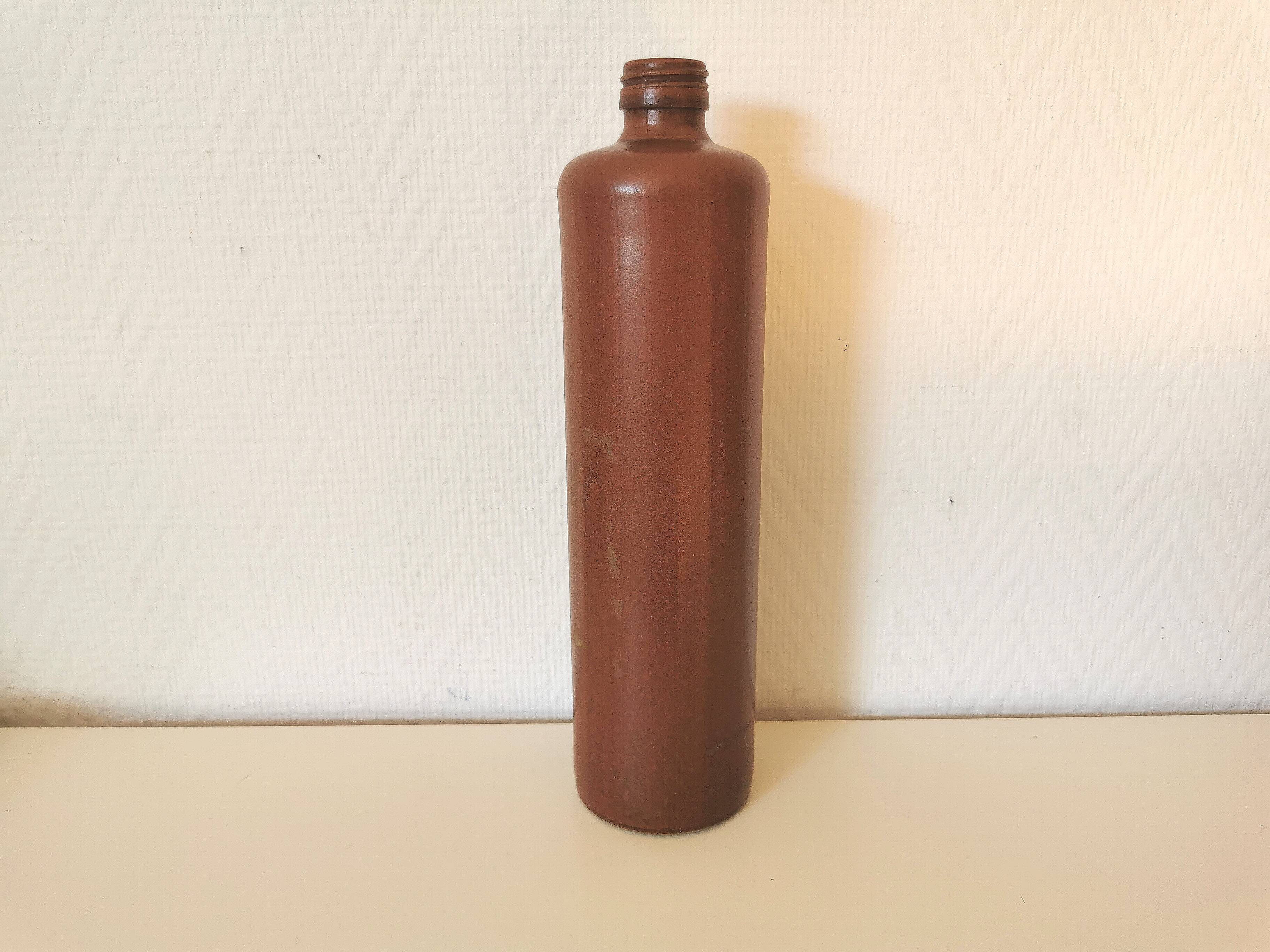 bottle, vase, soliflore in brown glazed stoneware