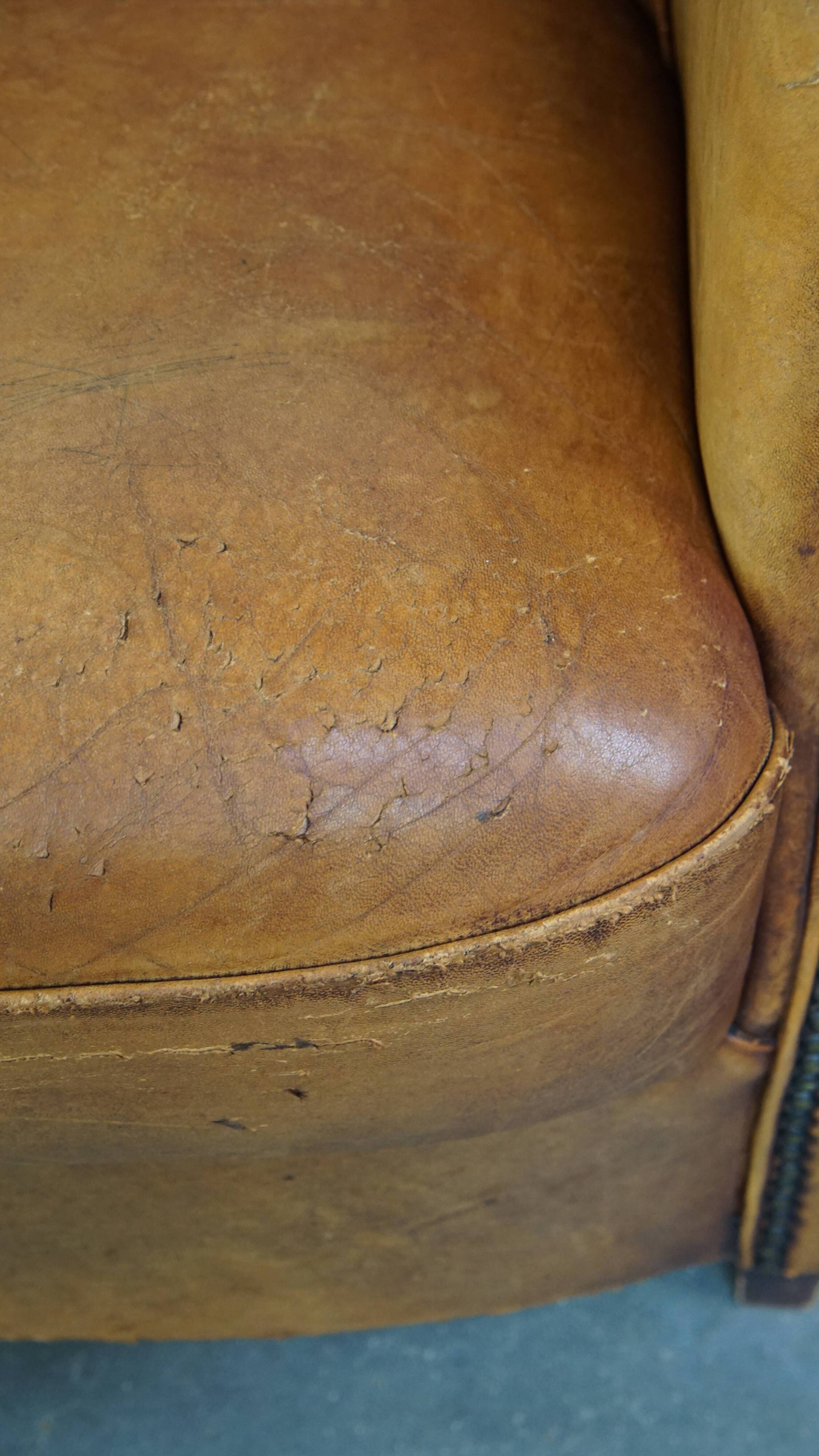 Fauteuil club vintage en cuir de mouton cognac clair
