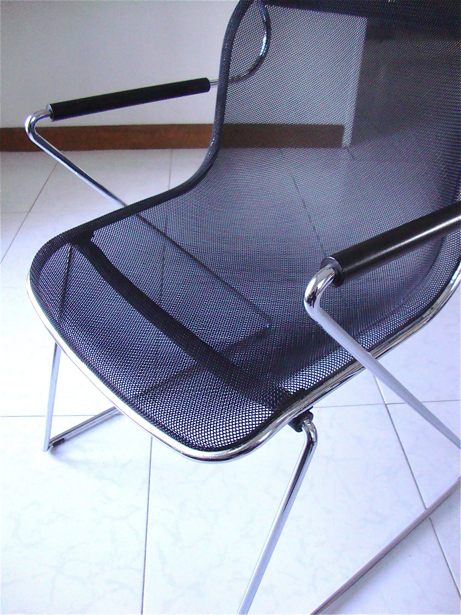 Penelope armchair by Charles Pollock