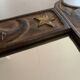 Miroir en bois sculpté ancien
