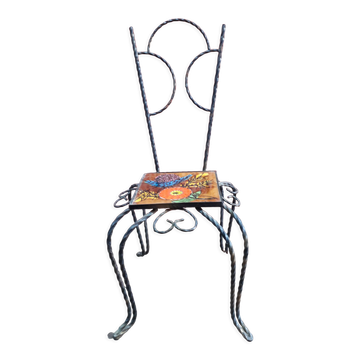 Wrought iron chair with enamelled plate signed Vallauris