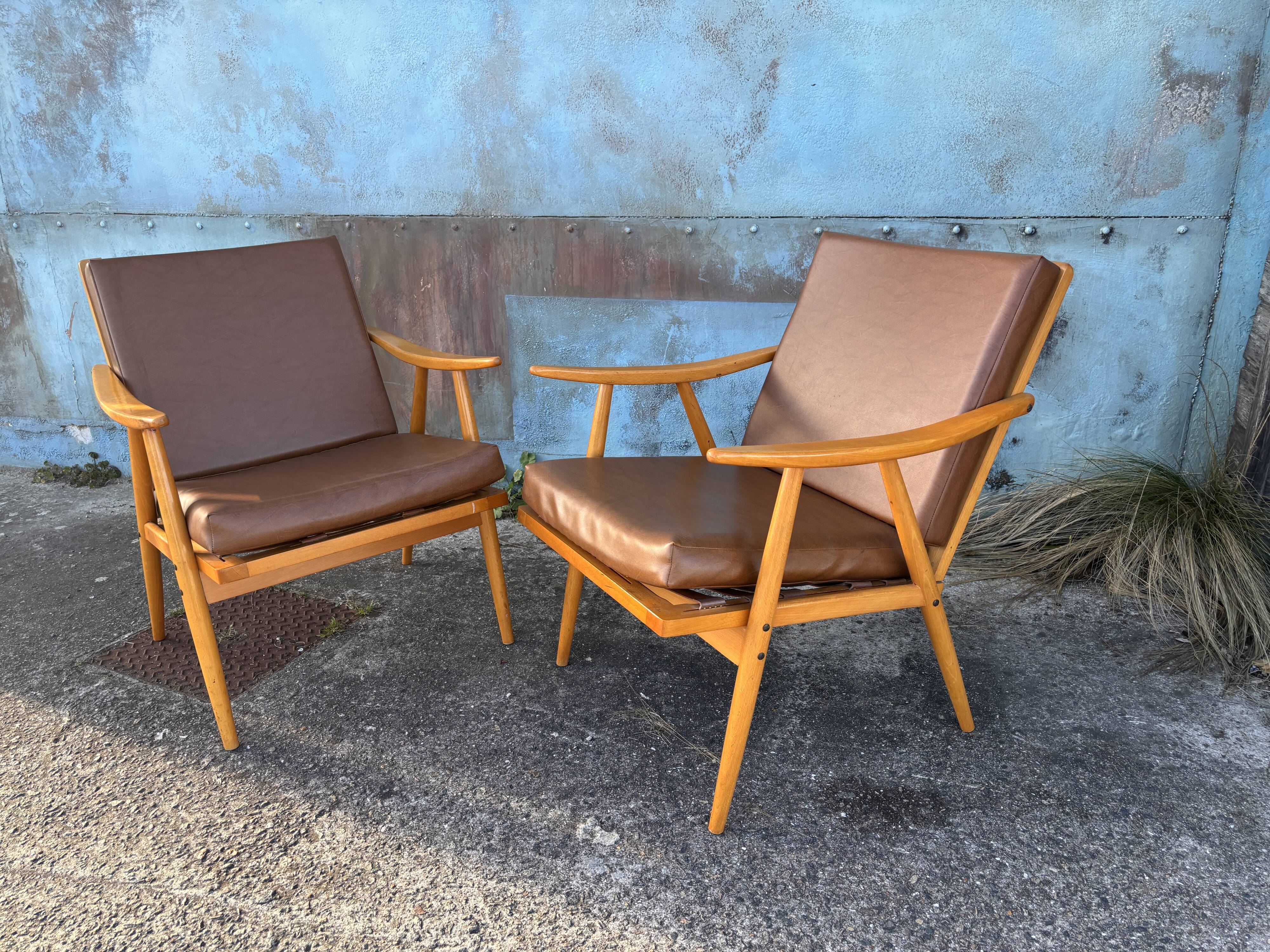 Pair of vintage armchairs with compass legs, "Boomerang" model by THO editions.