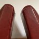 Paire de fauteuils vintage rouge bordeaux
