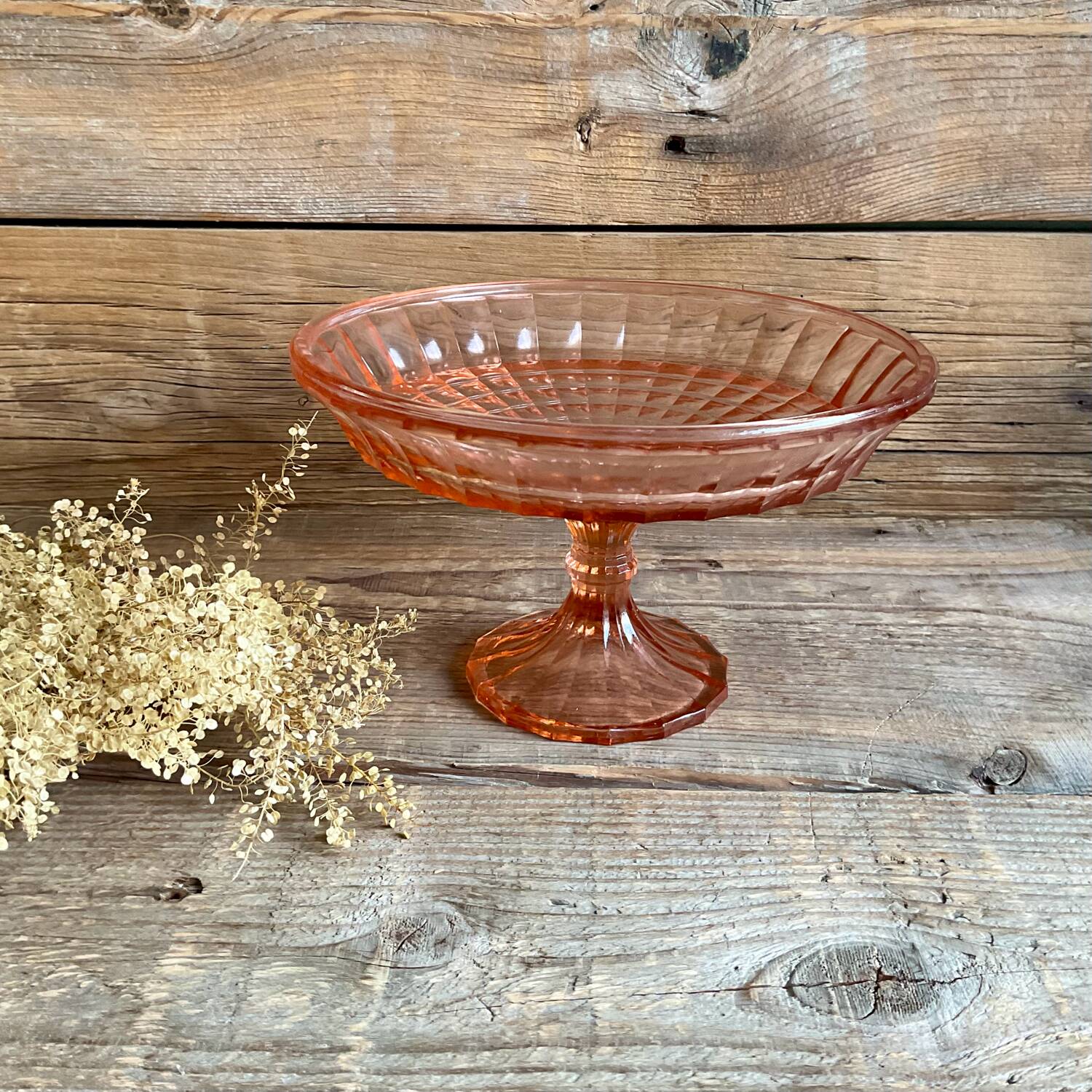Pink glass cup, fruit bowl