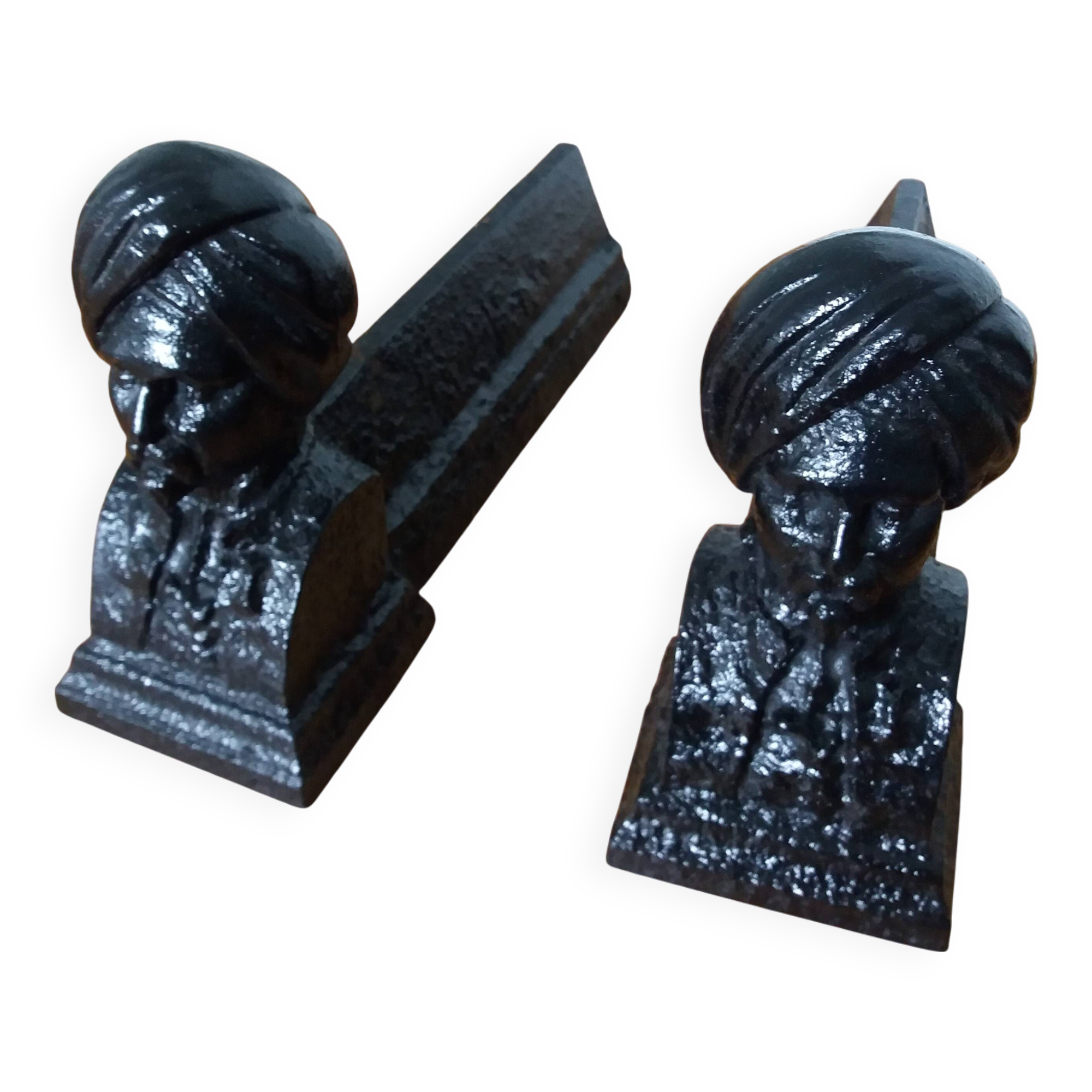 Cast iron andirons with character heads