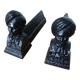 Cast iron andirons with character heads