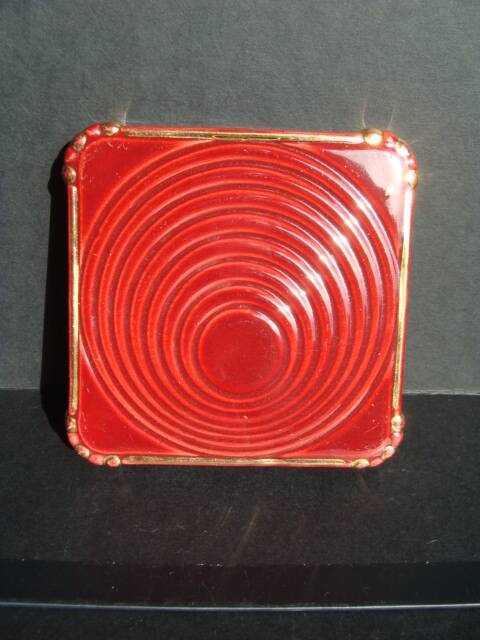 Art Deco trivet or bottle holder