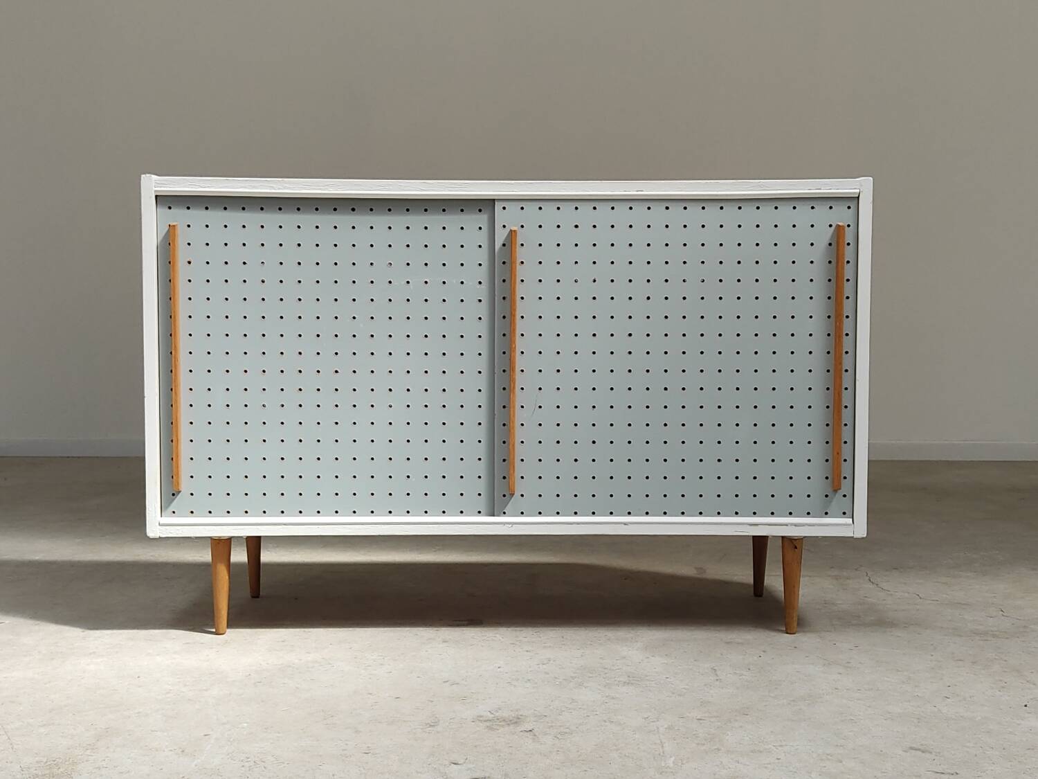 Blue and white chest of drawers by Drevopodnik Brno 1960