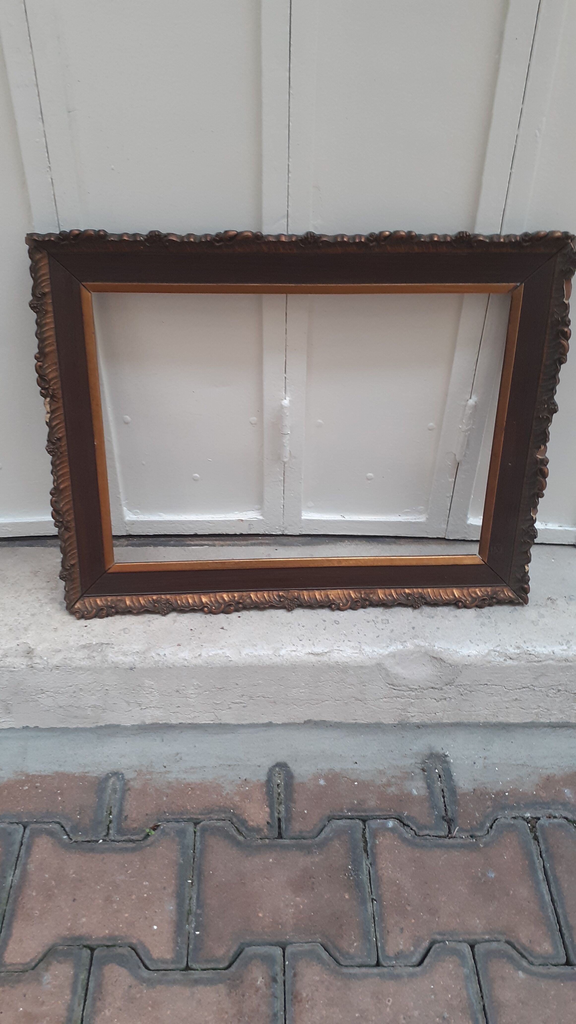 Carved frame with gilding