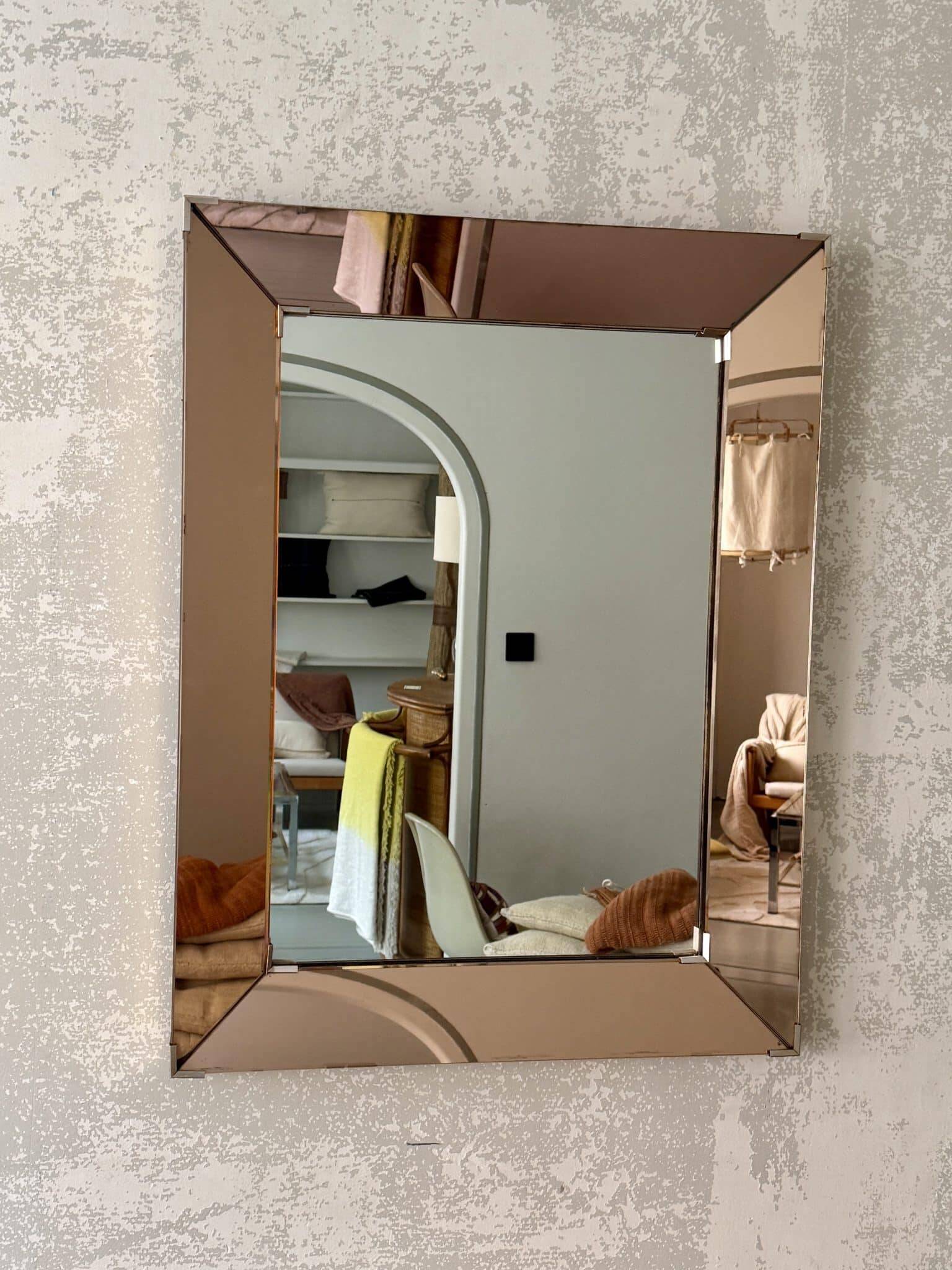 Faceted mirror with rose-coloured frame – Italy, 1980s