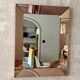 Faceted mirror with rose-coloured frame – Italy, 1980s