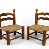 Pair of low straw chairs  circa 1940