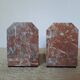 Pair of red marble bookends with black stone spheres – Art Style