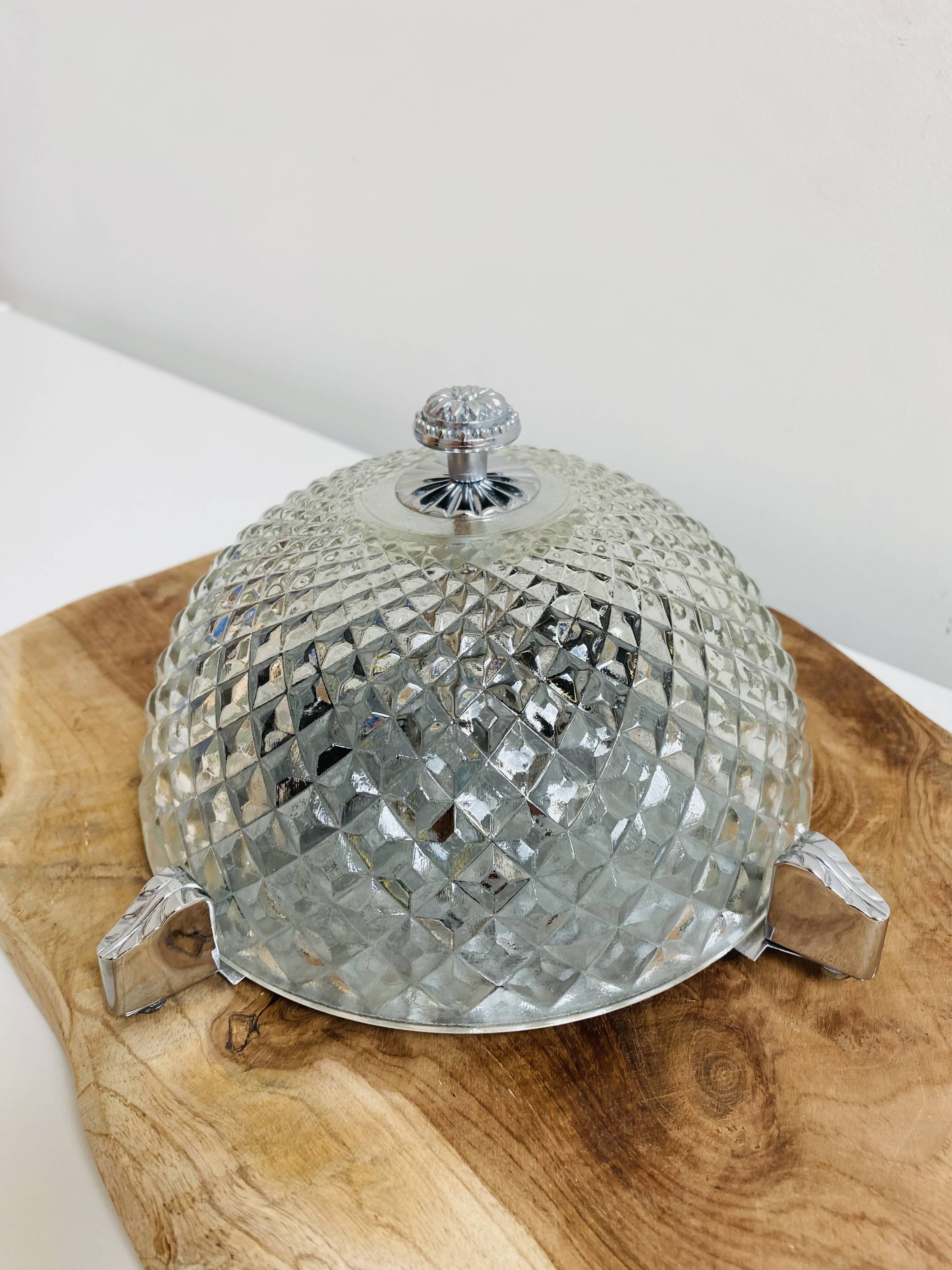 Pair of chrome-plated glass sconces