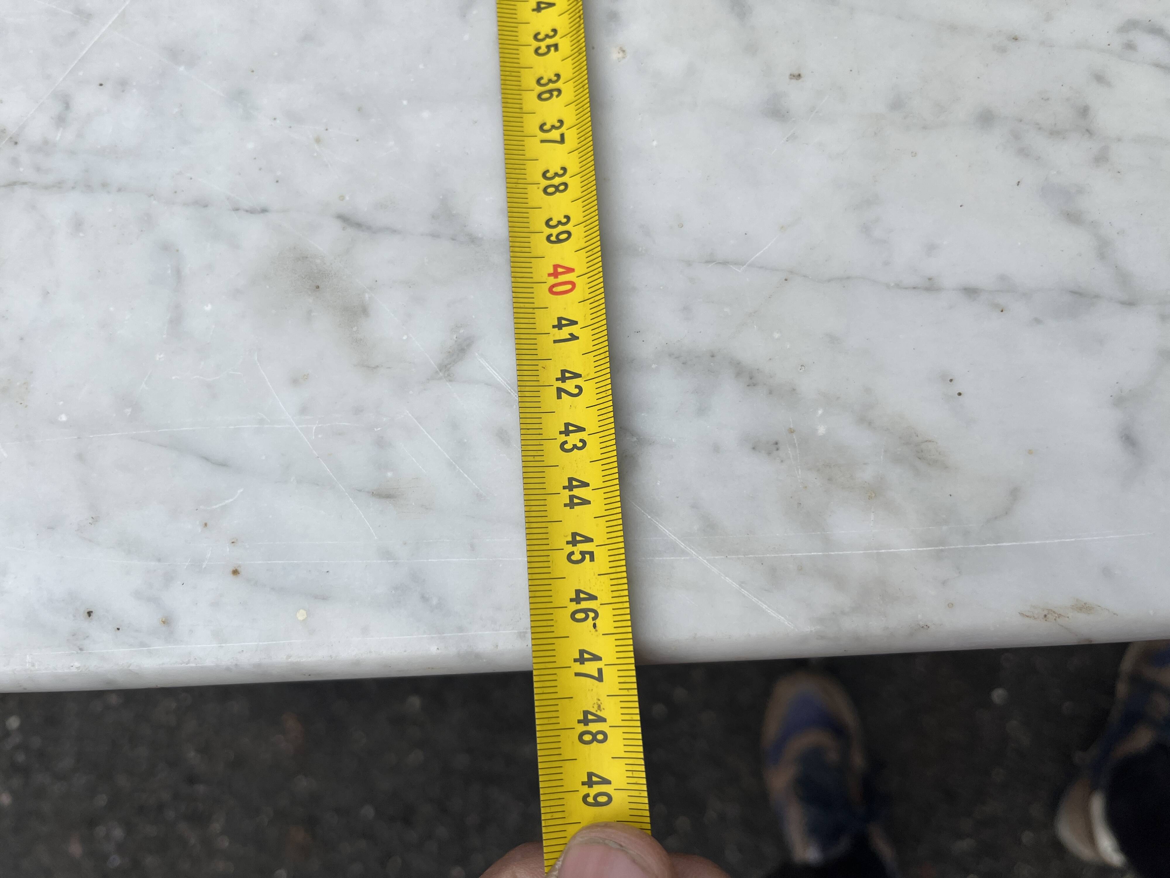 Antique 19th-century wooden chest of drawers with a marble top