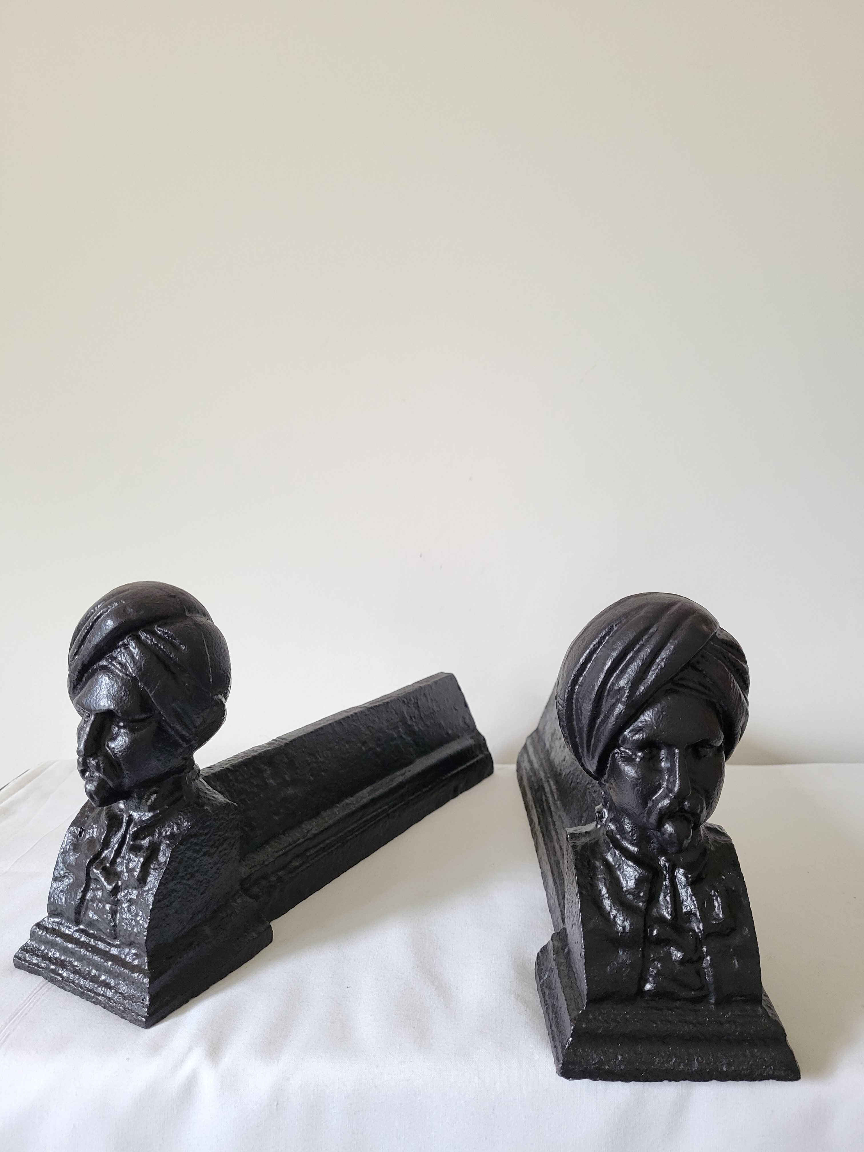 Pair of anthropomorphic cast iron chenets