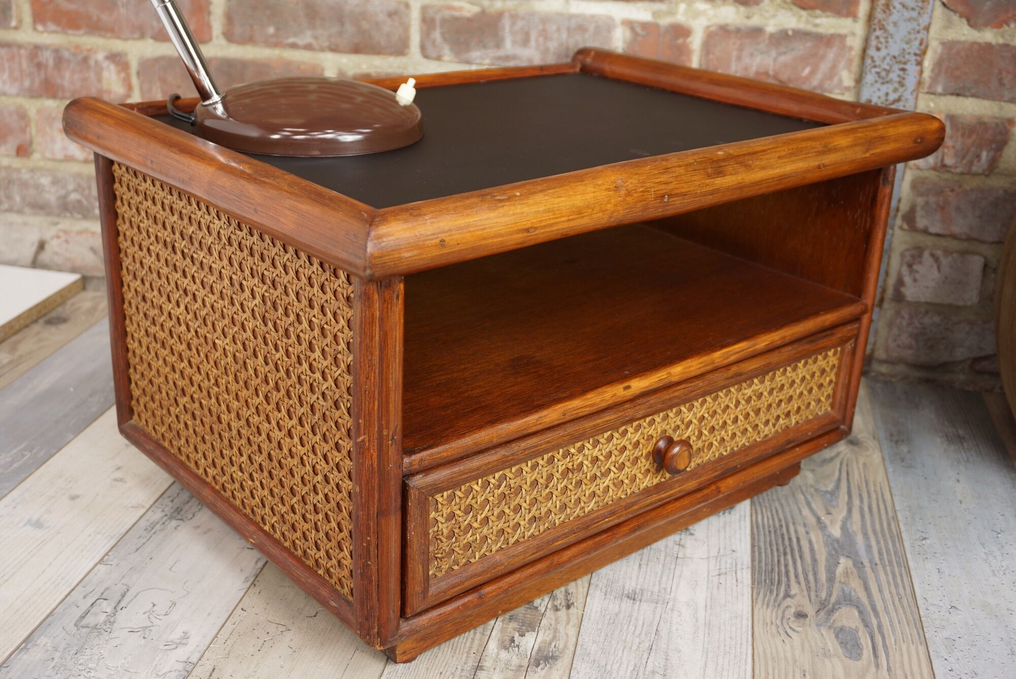 Pair of wooden bedside tables, rattan, canning and faux black leather