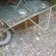 Former wooden and metal wheelbarrow