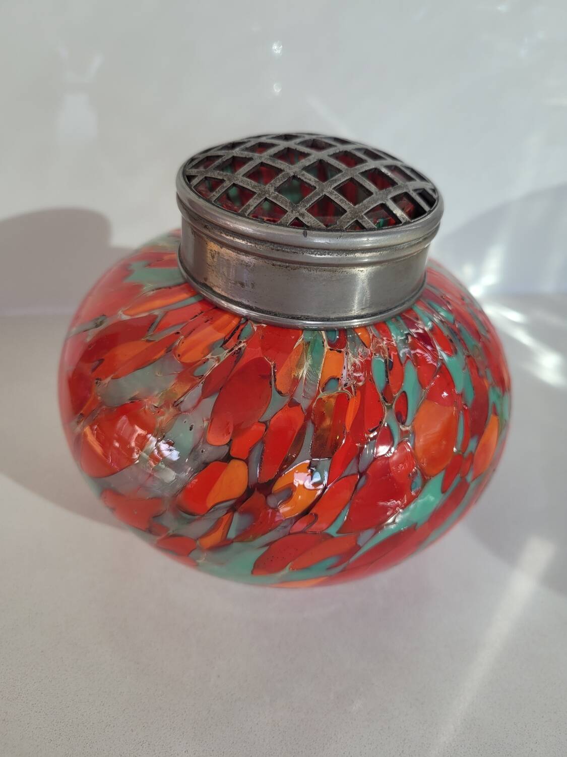 Old multi-colored glass flower vase