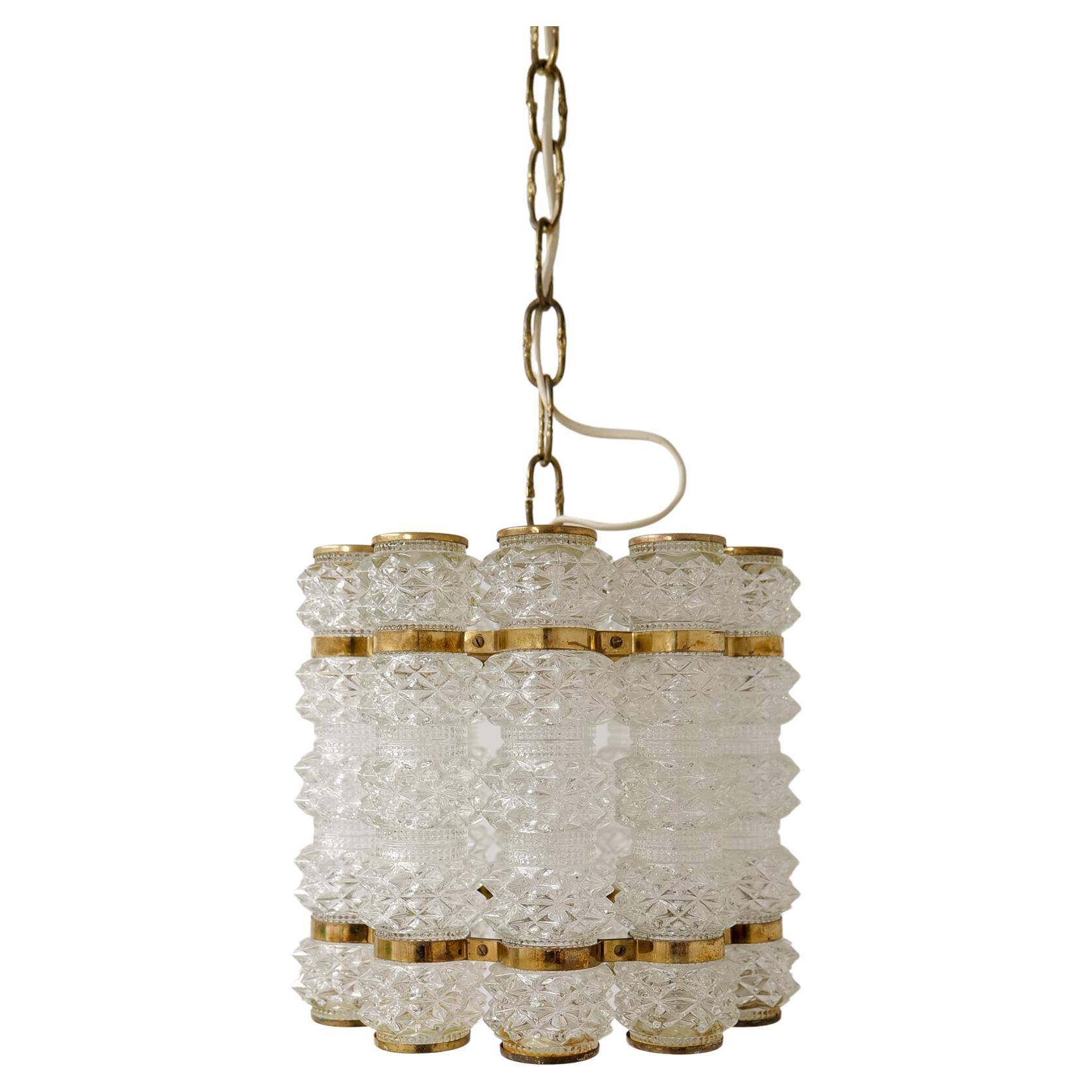 Cylindrical brass and crystal chandelier by Tyringe for Orrefors, Sweden.