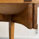 Round walnut Napoleon III extendable table with bronze top in good condition.