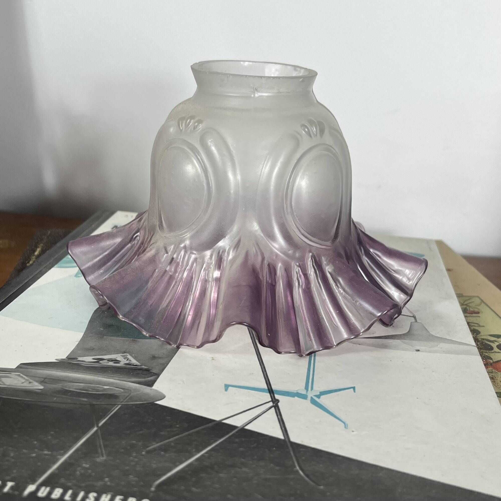 Antique tulip lampshade in transparent glass with a purple rim.