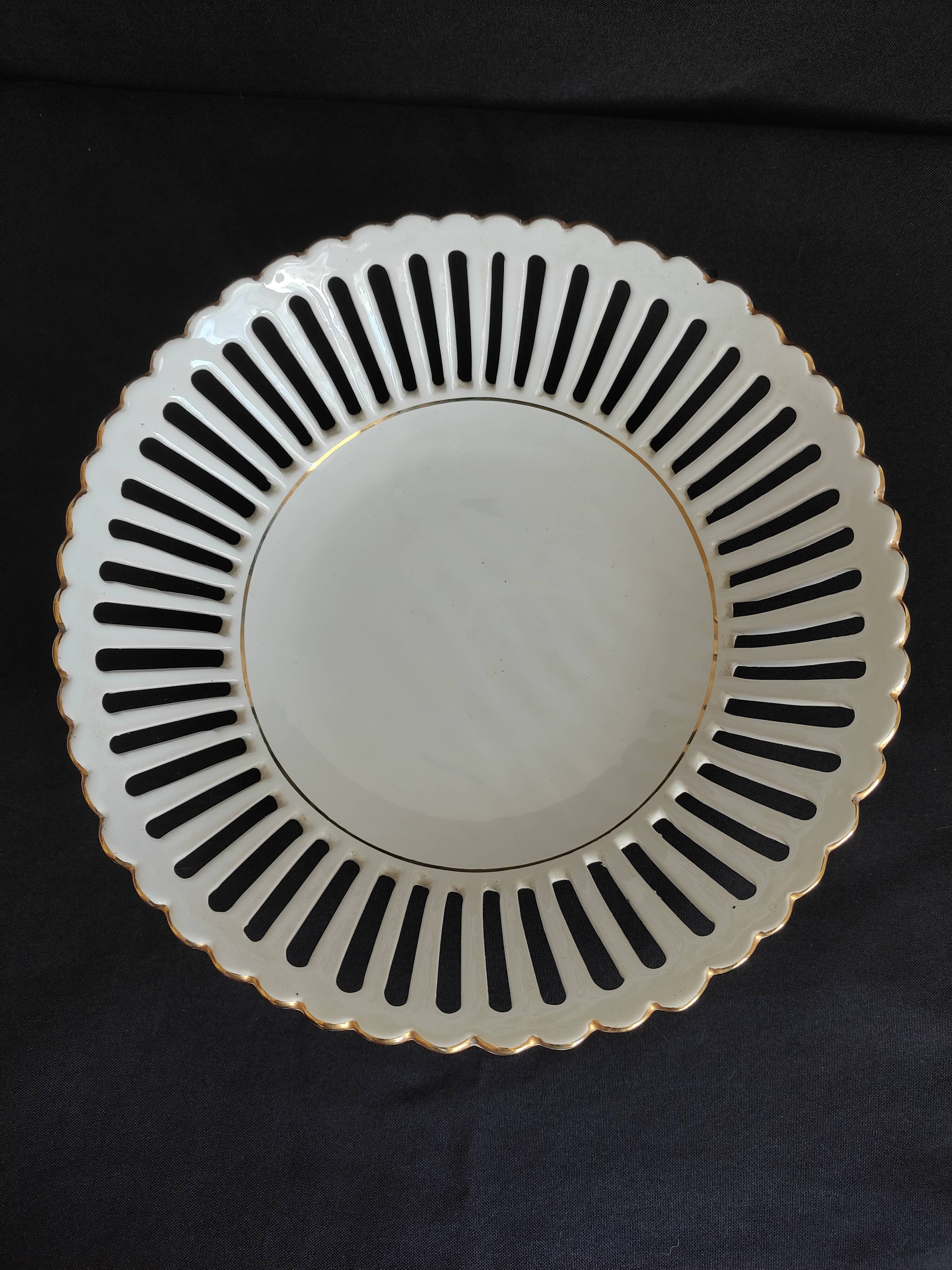 Openwork cut white porcelain and gilding