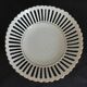 Openwork cut white porcelain and gilding