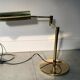 Koch and Lowe style brass articulated desk lamp