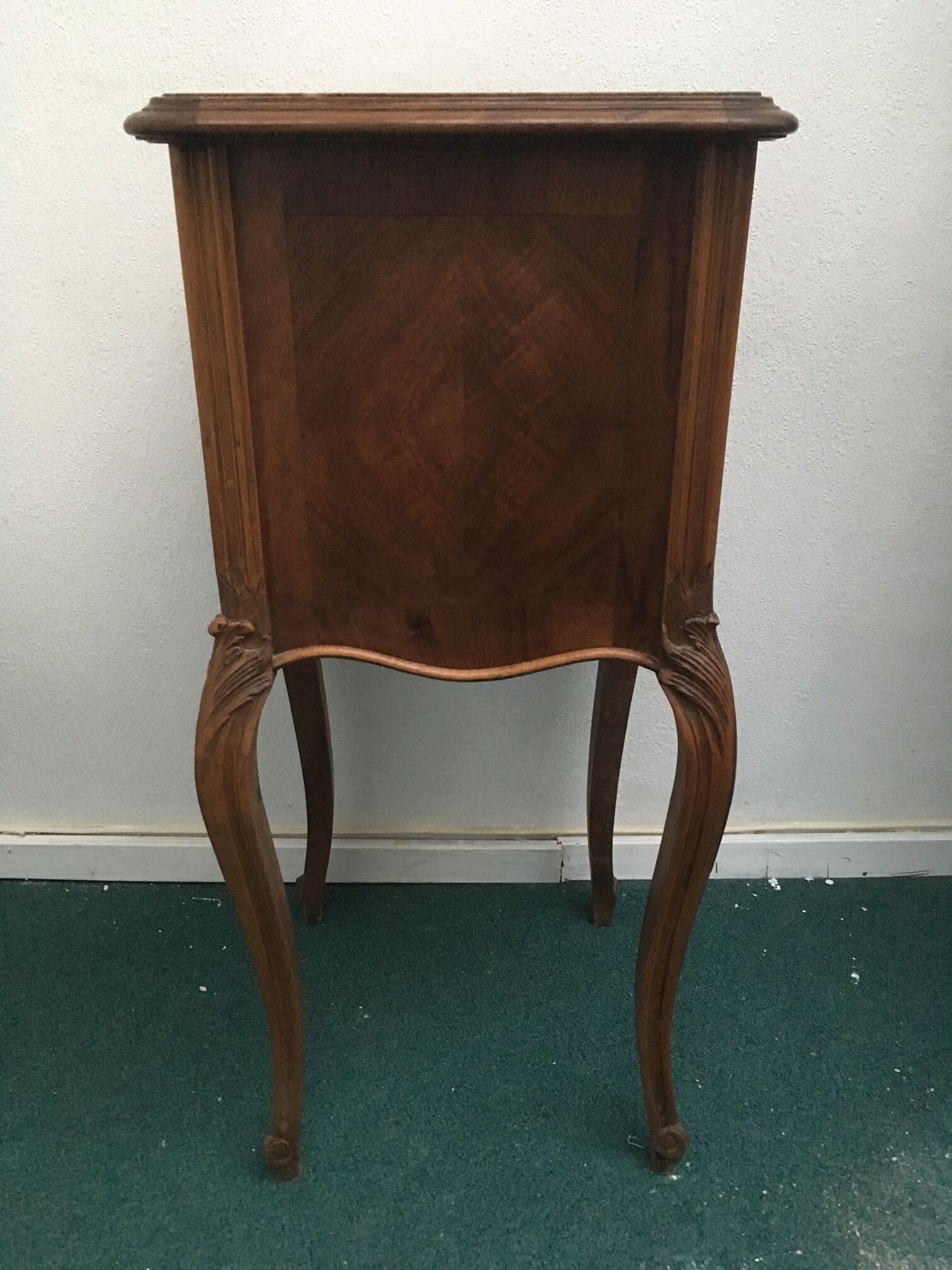 Louis Philippe beside table