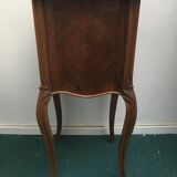Louis Philippe beside table