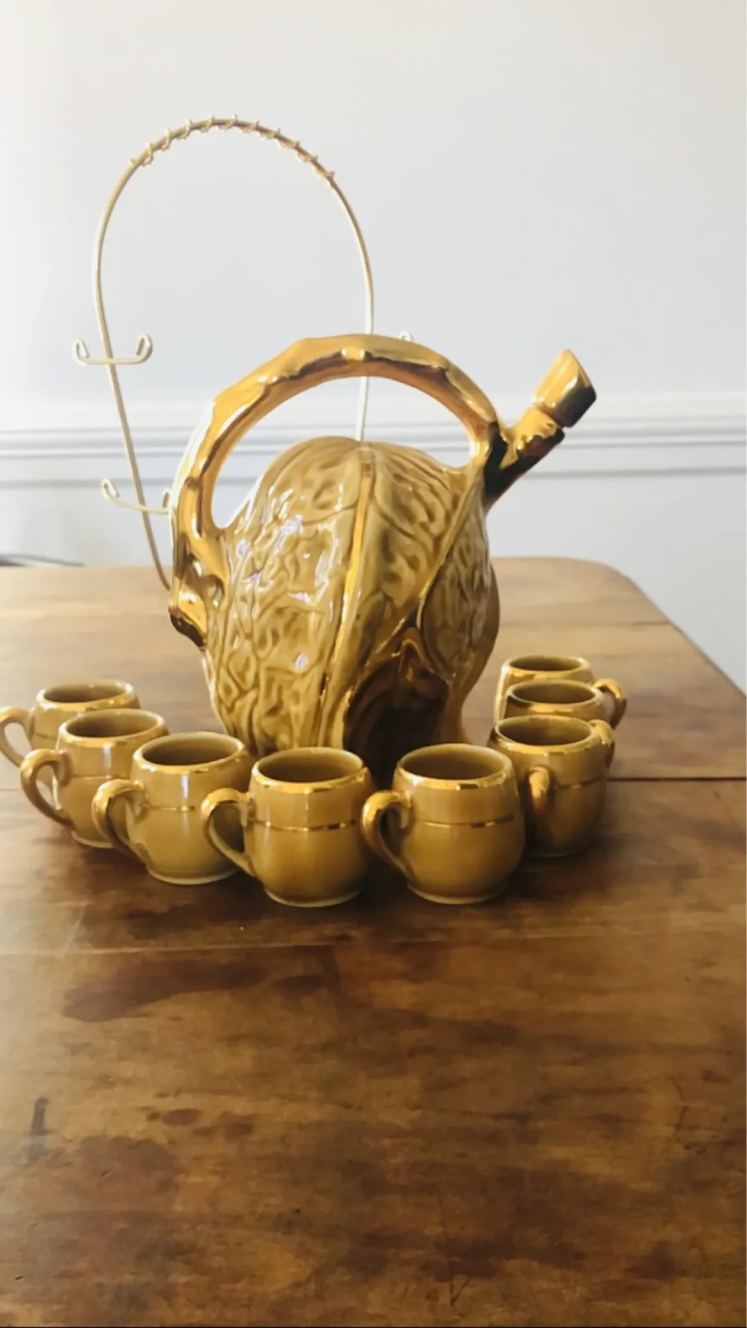 Liqueur service in walnut faience by the Louis Roque house.